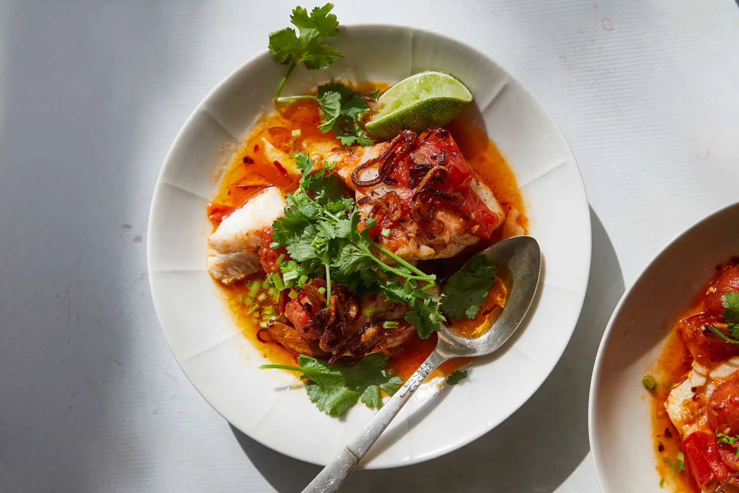 Tomato-Poached
Fish with Chile Oil and Herbs